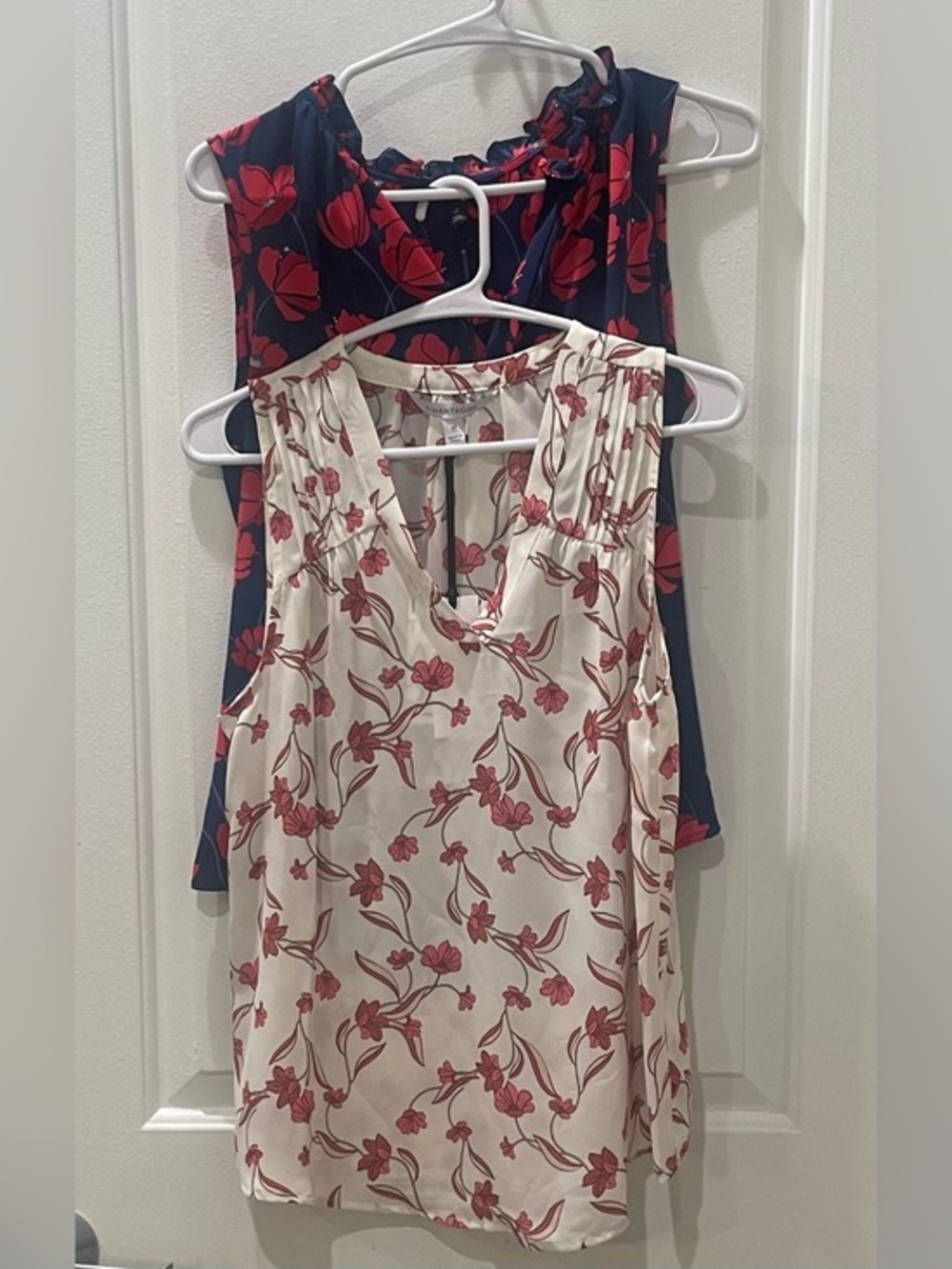 NEW…Bundle of 2 41Hawthorn Sleeveless Floral V-Neck Tops